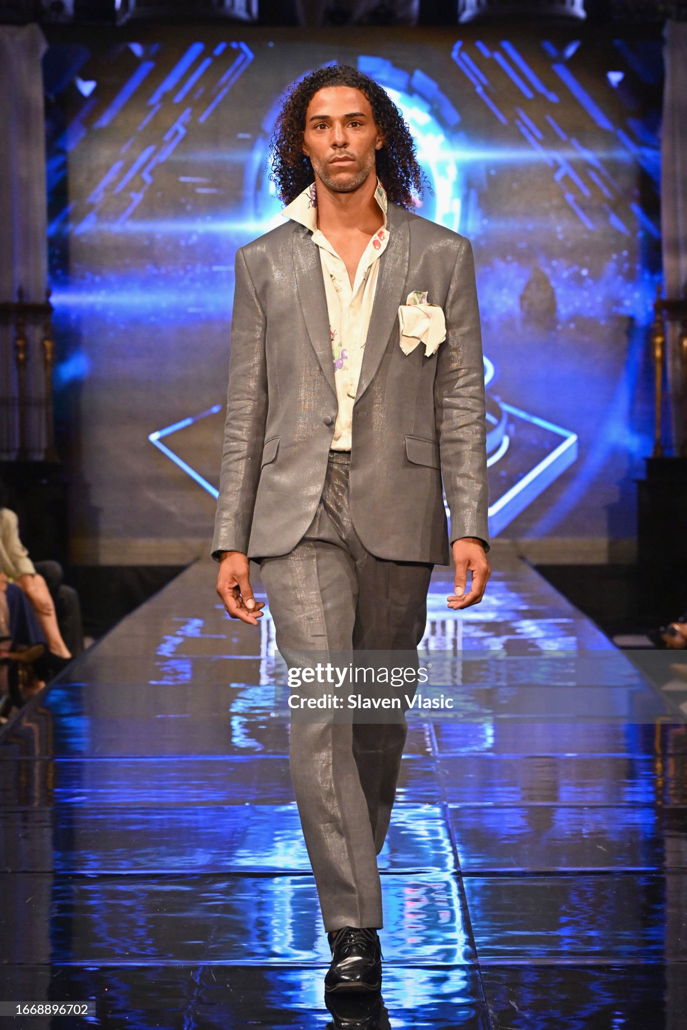 NEW YORK, NEW YORK - SEPTEMBER 08: A model walks the runway wearing designer Carlos Benguigui, during the NYFW hiTechMODA Season 10 Production at Gotham Hall on September 08, 2023, in New York City. (Photo by Slaven Vlasic/Getty Images for hiTechMODA)