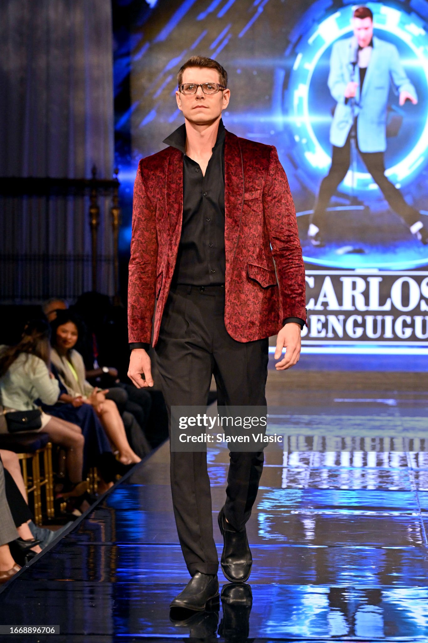 NEW YORK, NEW YORK - SEPTEMBER 08: A model walks the runway wearing designer Carlos Benguigui, during the NYFW hiTechMODA Season 10 Production at Gotham Hall on September 08, 2023, in New York City. (Photo by Slaven Vlasic/Getty Images for hiTechMODA)