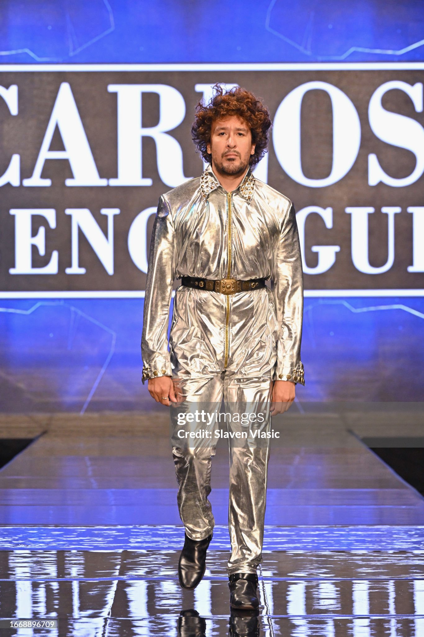 NEW YORK, NEW YORK - SEPTEMBER 08: A model walks the runway wearing designer Carlos Benguigui, during the NYFW hiTechMODA Season 10 Production at Gotham Hall on September 08, 2023, in New York City. (Photo by Slaven Vlasic/Getty Images for hiTechMODA)