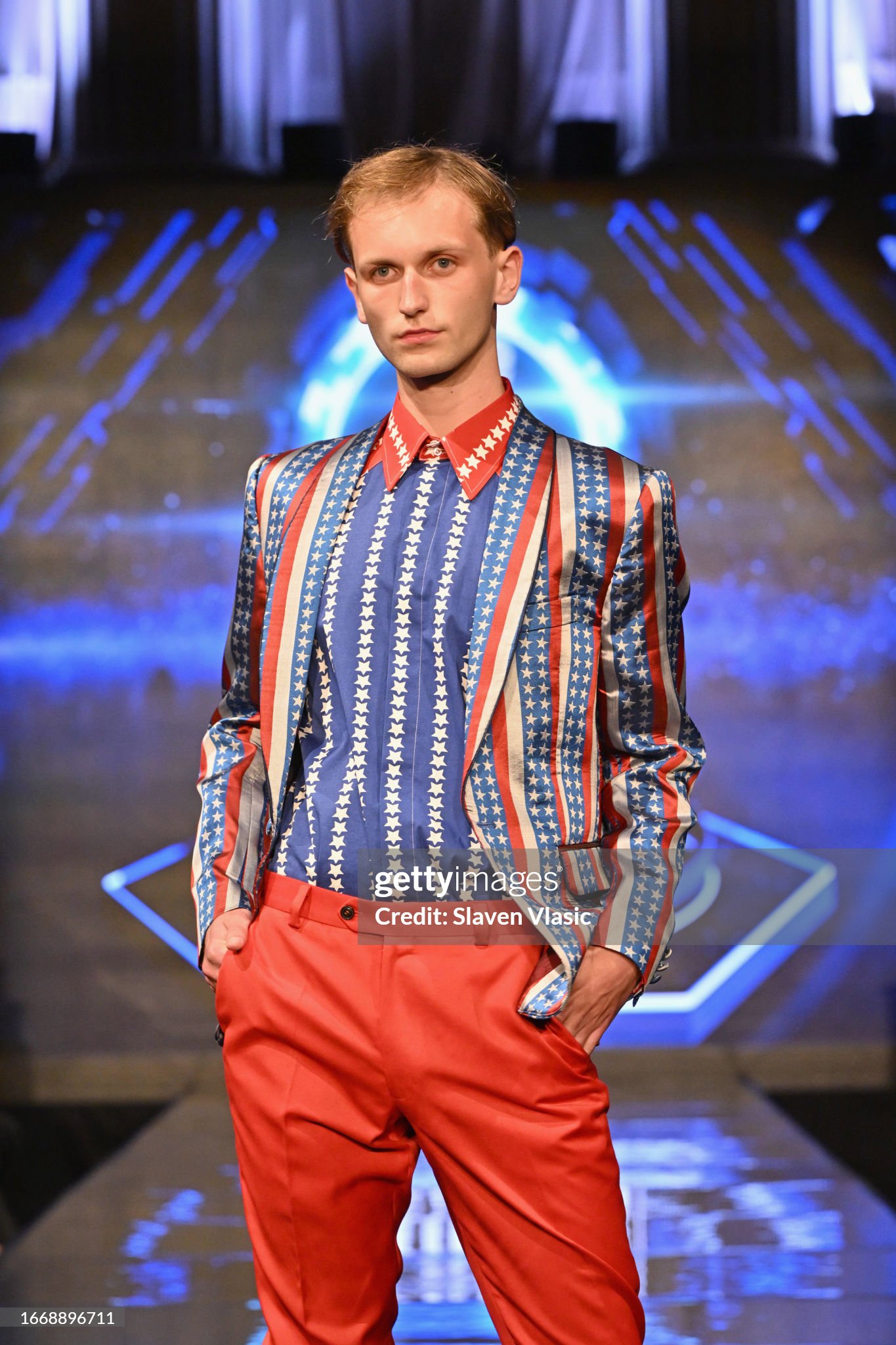 NEW YORK, NEW YORK - SEPTEMBER 08: A model walks the runway wearing designer Carlos Benguigui, during the NYFW hiTechMODA Season 10 Production at Gotham Hall on September 08, 2023, in New York City. (Photo by Slaven Vlasic/Getty Images for hiTechMODA)