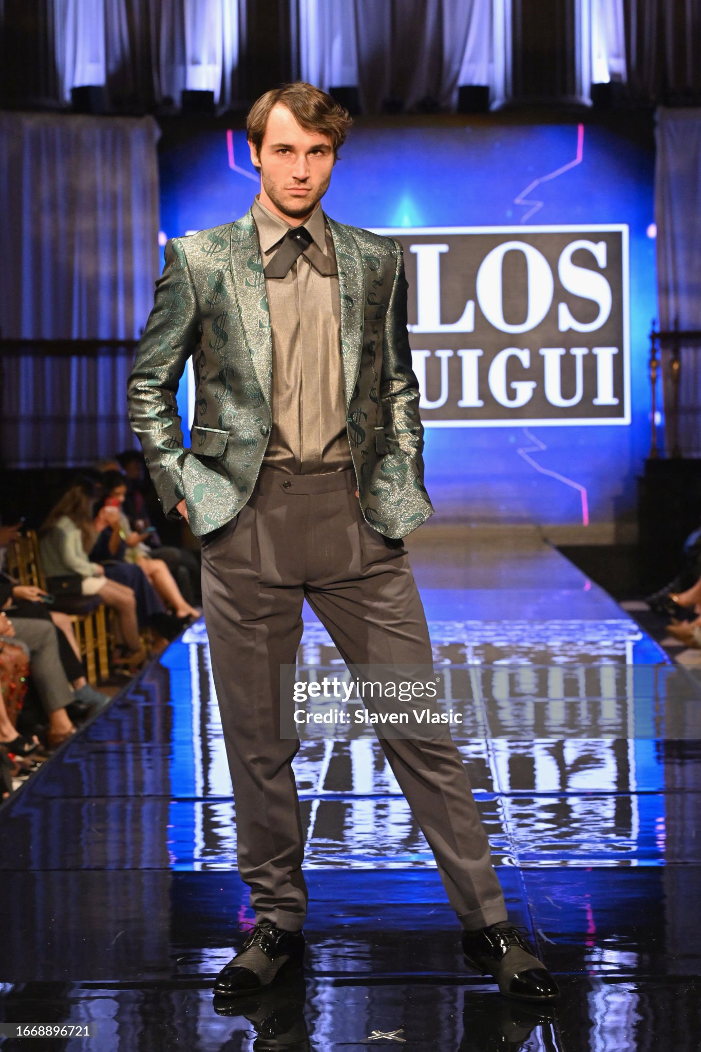 NEW YORK, NEW YORK - SEPTEMBER 08: A model walks the runway wearing designer Carlos Benguigui, during the NYFW hiTechMODA Season 10 Production at Gotham Hall on September 08, 2023, in New York City. (Photo by Slaven Vlasic/Getty Images for hiTechMODA)
