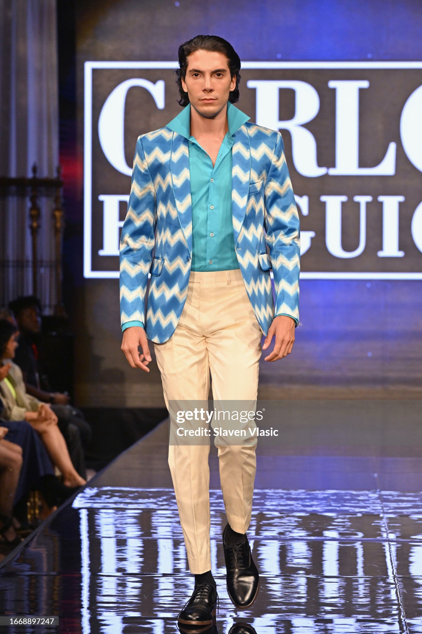 NEW YORK, NEW YORK - SEPTEMBER 08: A model walks the runway wearing designer Carlos Benguigui, during the NYFW hiTechMODA Season 10 Production at Gotham Hall on September 08, 2023, in New York City. (Photo by Slaven Vlasic/Getty Images for hiTechMODA)