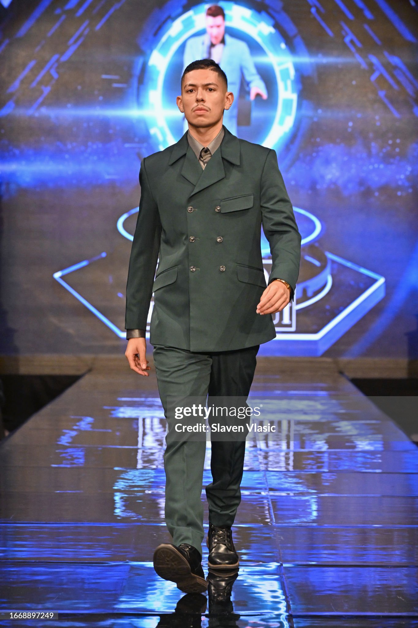 NEW YORK, NEW YORK - SEPTEMBER 08: A model walks the runway wearing designer Carlos Benguigui, during the NYFW hiTechMODA Season 10 Production at Gotham Hall on September 08, 2023, in New York City. (Photo by Slaven Vlasic/Getty Images for hiTechMODA)