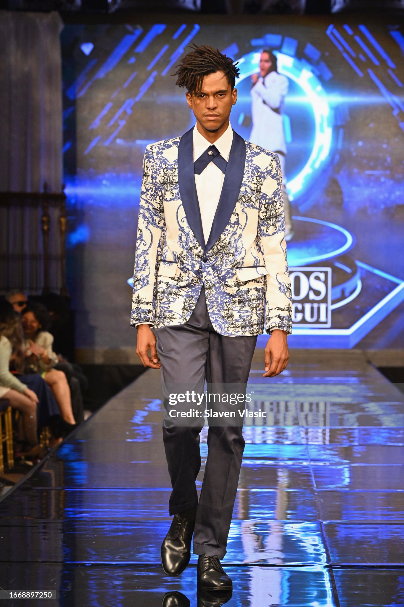 NEW YORK, NEW YORK - SEPTEMBER 08: A model walks the runway wearing designer Carlos Benguigui, during the NYFW hiTechMODA Season 10 Production at Gotham Hall on September 08, 2023, in New York City. (Photo by Slaven Vlasic/Getty Images for hiTechMODA)